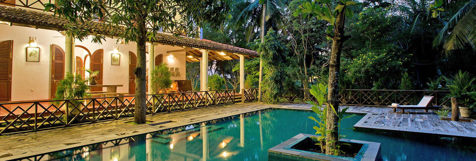 Oceans Edege - Pool and villa lit up at night