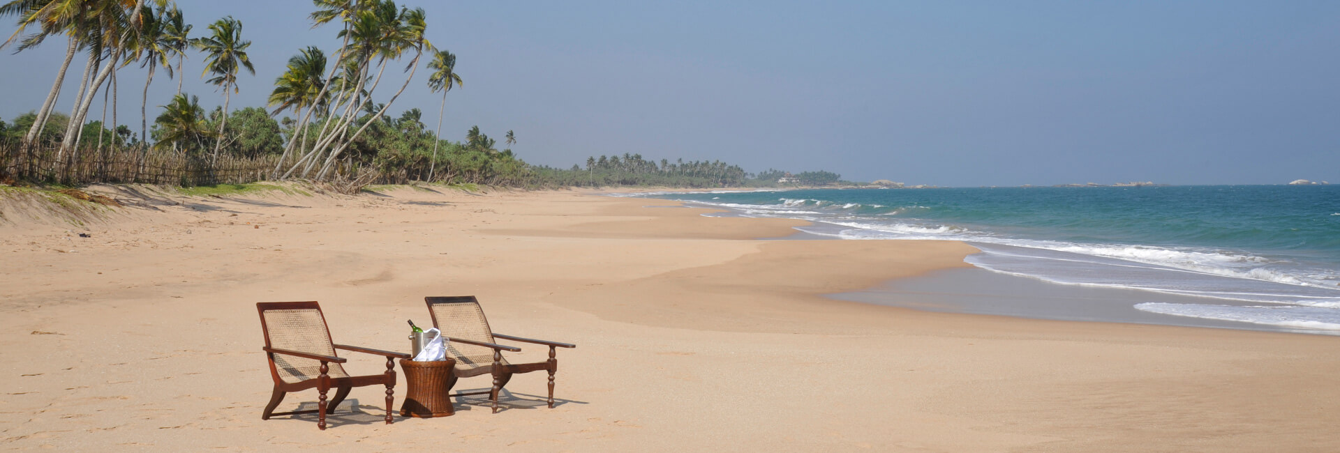 Oceans Edge - Chairs on the beach in front of the villa